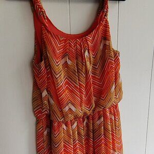 Sundress in an Orange Cream and Brown colorway. Fully lined & Pleated. Easy Care